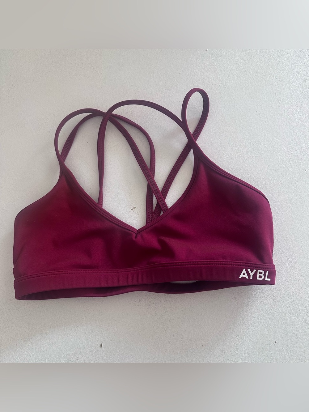 Aybl Essential Strappy Sports Bra in cranberry color small second skin yoga